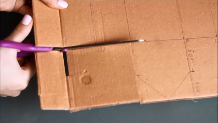 Step-by-step instructions for making a cardboard New Year's house