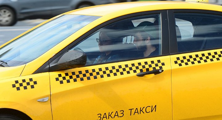 taxi driver in car