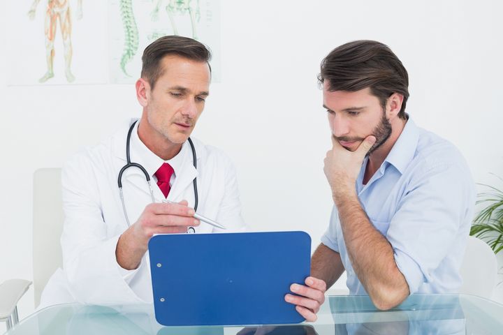 A man examined by a doctor