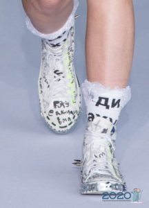 Fashionable sneakers with inscriptions for 2020