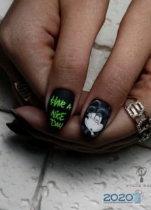 Nail painting for 2020 - words and pictures on a black background